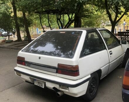 Белый Мицубиси Мираж, объемом двигателя 1.3 л и пробегом 283 тыс. км за 350 $, фото 1 на Automoto.ua