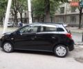 Черный Мицубиси Мираж, объемом двигателя 1.19 л и пробегом 107 тыс. км за 6500 $, фото 5 на Automoto.ua