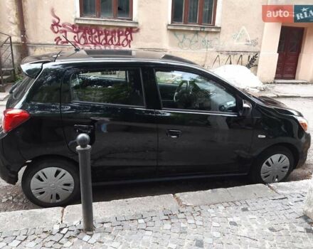 Черный Мицубиси Мираж, объемом двигателя 1.19 л и пробегом 107 тыс. км за 6500 $, фото 3 на Automoto.ua