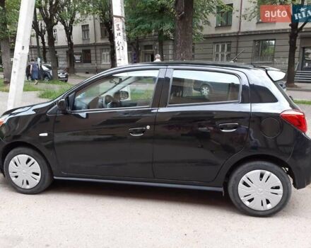 Черный Мицубиси Мираж, объемом двигателя 1.19 л и пробегом 107 тыс. км за 6500 $, фото 8 на Automoto.ua