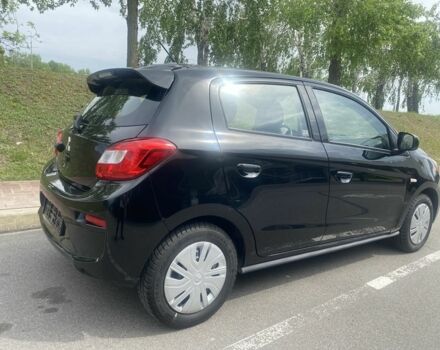 Черный Мицубиси Мираж, объемом двигателя 1.2 л и пробегом 40 тыс. км за 9450 $, фото 12 на Automoto.ua