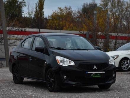 Черный Мицубиси Мираж, объемом двигателя 1.2 л и пробегом 70 тыс. км за 9650 $, фото 1 на Automoto.ua