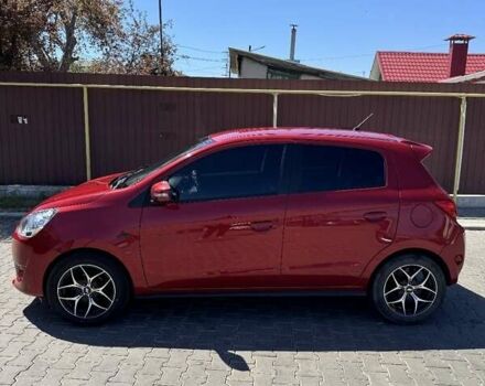 Красный Мицубиси Мираж, объемом двигателя 1.2 л и пробегом 190 тыс. км за 6500 $, фото 1 на Automoto.ua