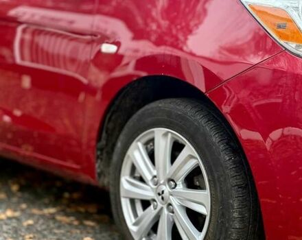 Красный Мицубиси Мираж, объемом двигателя 1.2 л и пробегом 60 тыс. км за 8500 $, фото 6 на Automoto.ua