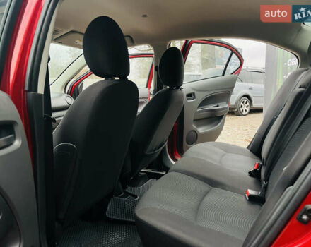 Червоний Міцубісі Міраж, об'ємом двигуна 1.2 л та пробігом 59 тис. км за 8600 $, фото 12 на Automoto.ua