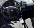 Красный Мицубиси Мираж, объемом двигателя 1.2 л и пробегом 190 тыс. км за 6500 $, фото 8 на Automoto.ua