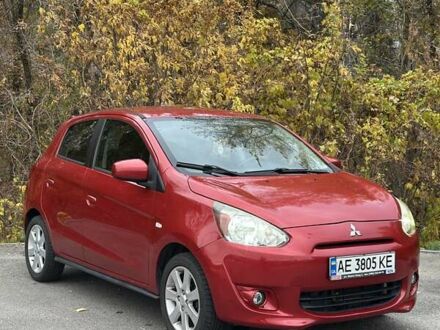 Красный Мицубиси Мираж, объемом двигателя 1.2 л и пробегом 102 тыс. км за 6900 $, фото 1 на Automoto.ua