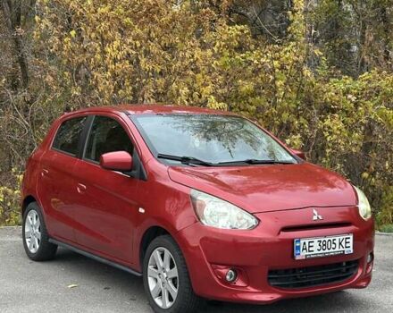 Красный Мицубиси Мираж, объемом двигателя 1.2 л и пробегом 102 тыс. км за 6900 $, фото 1 на Automoto.ua