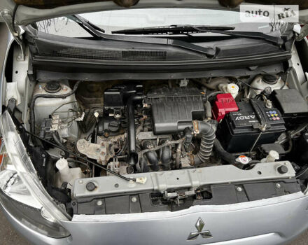 Серый Мицубиси Мираж, объемом двигателя 1.19 л и пробегом 64 тыс. км за 7000 $, фото 23 на Automoto.ua