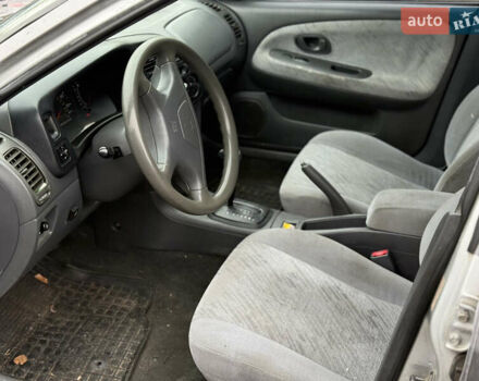 Серый Мицубиси Мираж, объемом двигателя 1.8 л и пробегом 300 тыс. км за 2100 $, фото 6 на Automoto.ua