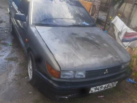 Сірий Міцубісі Міраж, об'ємом двигуна 1.5 л та пробігом 400 тис. км за 500 $, фото 1 на Automoto.ua