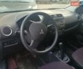 Синій Міцубісі Міраж, об'ємом двигуна 1.2 л та пробігом 120 тис. км за 5300 $, фото 4 на Automoto.ua
