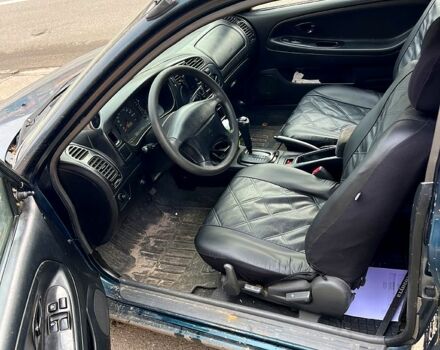 Зеленый Мицубиси Мираж, объемом двигателя 1.5 л и пробегом 165 тыс. км за 1900 $, фото 6 на Automoto.ua