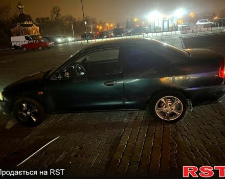 Зеленый Мицубиси Мираж, объемом двигателя 1.5 л и пробегом 165 тыс. км за 1900 $, фото 4 на Automoto.ua