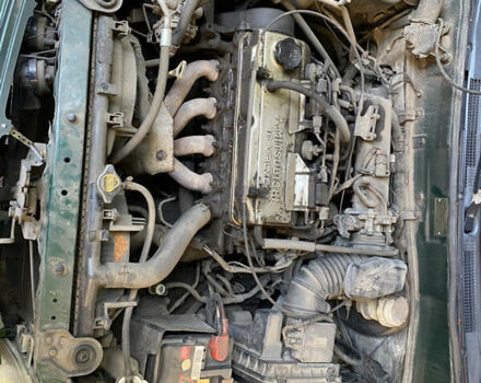 Зеленый Мицубиси Мираж, объемом двигателя 1.6 л и пробегом 300 тыс. км за 2500 $, фото 12 на Automoto.ua
