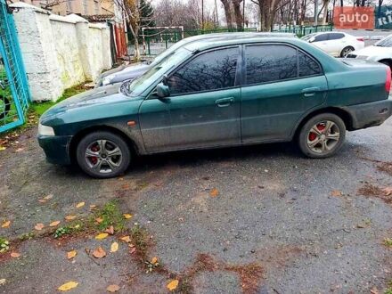 Зеленый Мицубиси Мираж, объемом двигателя 1.6 л и пробегом 340 тыс. км за 2850 $, фото 1 на Automoto.ua