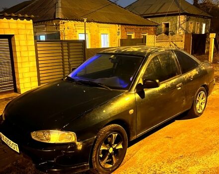 Зеленый Мицубиси Мираж, объемом двигателя 1.5 л и пробегом 165 тыс. км за 1900 $, фото 1 на Automoto.ua