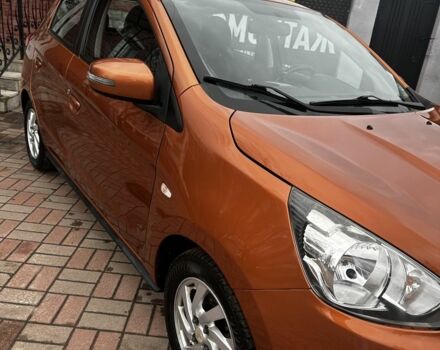 Помаранчевий Міцубісі Міраж, об'ємом двигуна 1.2 л та пробігом 110 тис. км за 6800 $, фото 4 на Automoto.ua