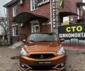 Помаранчевий Міцубісі Міраж, об'ємом двигуна 1.2 л та пробігом 110 тис. км за 6800 $, фото 1 на Automoto.ua
