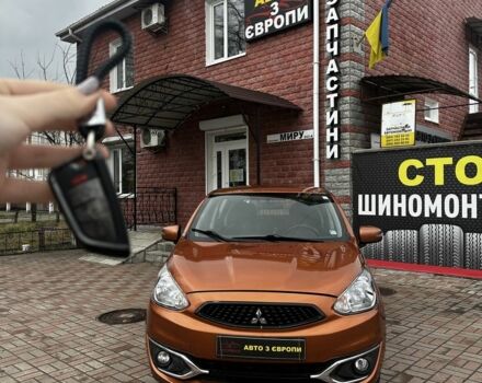 Помаранчевий Міцубісі Міраж, об'ємом двигуна 1.2 л та пробігом 110 тис. км за 6800 $, фото 3 на Automoto.ua