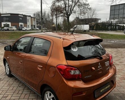 Помаранчевий Міцубісі Міраж, об'ємом двигуна 1.2 л та пробігом 110 тис. км за 6800 $, фото 7 на Automoto.ua