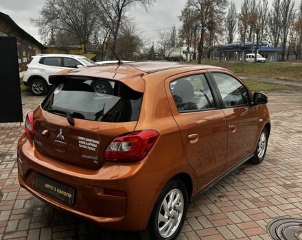 Помаранчевий Міцубісі Міраж, об'ємом двигуна 1.2 л та пробігом 110 тис. км за 6800 $, фото 6 на Automoto.ua