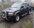 Черный Мицубиси Монтеро, объемом двигателя 2.5 л и пробегом 207 тыс. км за 7000 $, фото 1 на Automoto.ua