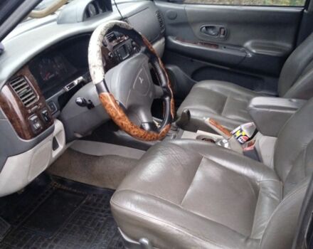 Черный Мицубиси Монтеро, объемом двигателя 2.5 л и пробегом 207 тыс. км за 7000 $, фото 4 на Automoto.ua