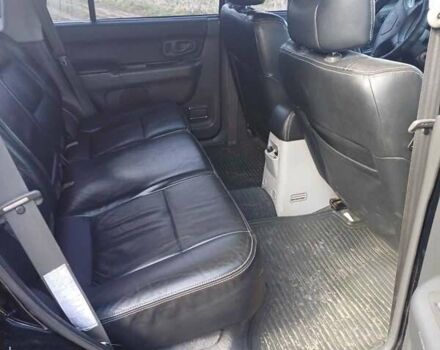 Черный Мицубиси Монтеро, объемом двигателя 3 л и пробегом 100 тыс. км за 11000 $, фото 6 на Automoto.ua