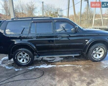 Черный Мицубиси Монтеро, объемом двигателя 3 л и пробегом 100 тыс. км за 11000 $, фото 8 на Automoto.ua