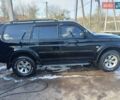 Черный Мицубиси Монтеро, объемом двигателя 3 л и пробегом 100 тыс. км за 11000 $, фото 8 на Automoto.ua
