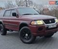 Красный Мицубиси Монтеро, объемом двигателя 3 л и пробегом 155 тыс. км за 5333 $, фото 1 на Automoto.ua