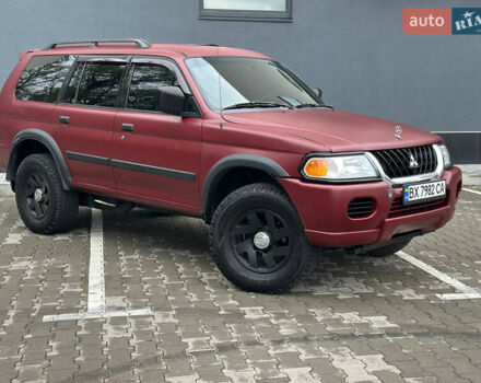 Красный Мицубиси Монтеро, объемом двигателя 2.97 л и пробегом 155 тыс. км за 4700 $, фото 2 на Automoto.ua
