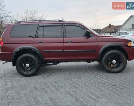 Красный Мицубиси Монтеро, объемом двигателя 3 л и пробегом 155 тыс. км за 5333 $, фото 11 на Automoto.ua