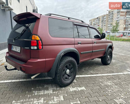 Красный Мицубиси Монтеро, объемом двигателя 2.97 л и пробегом 155 тыс. км за 4700 $, фото 4 на Automoto.ua