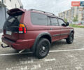 Красный Мицубиси Монтеро, объемом двигателя 2.97 л и пробегом 155 тыс. км за 4700 $, фото 4 на Automoto.ua