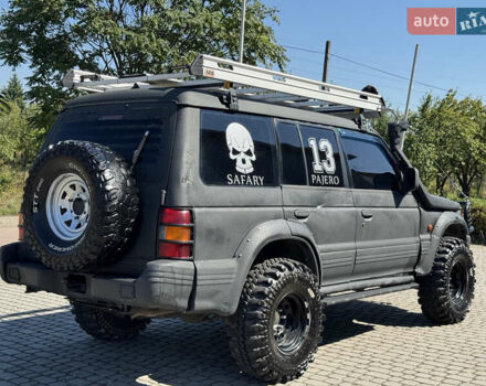 Сірий Міцубісі Монтеро, об'ємом двигуна 3 л та пробігом 300 тис. км за 10999 $, фото 2 на Automoto.ua