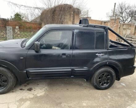 Серый Мицубиси Монтеро, объемом двигателя 3.2 л и пробегом 300 тыс. км за 5500 $, фото 2 на Automoto.ua