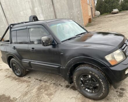 Серый Мицубиси Монтеро, объемом двигателя 3.2 л и пробегом 300 тыс. км за 5500 $, фото 4 на Automoto.ua