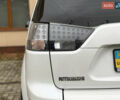 Белый Мицубиси Аутлендер ХЛ, объемом двигателя 3 л и пробегом 216 тыс. км за 10500 $, фото 46 на Automoto.ua
