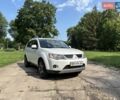 Білий Міцубісі Аутлендер ХЛ, об'ємом двигуна 3 л та пробігом 148 тис. км за 9900 $, фото 1 на Automoto.ua