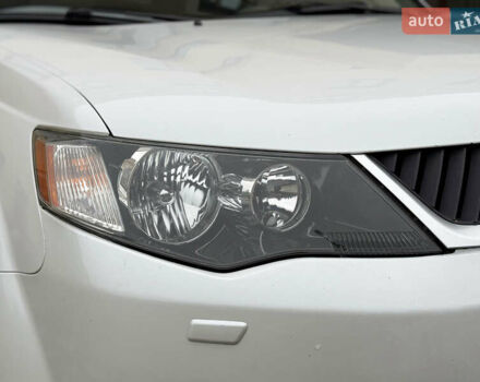 Белый Мицубиси Аутлендер ХЛ, объемом двигателя 3 л и пробегом 216 тыс. км за 10500 $, фото 22 на Automoto.ua