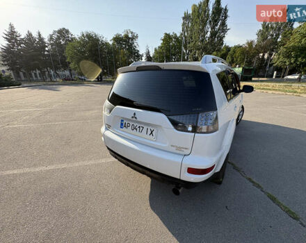 Белый Мицубиси Аутлендер ХЛ, объемом двигателя 2.36 л и пробегом 155 тыс. км за 10950 $, фото 71 на Automoto.ua