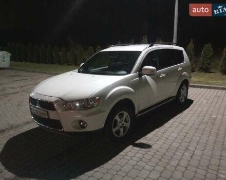 Белый Мицубиси Аутлендер ХЛ, объемом двигателя 2.36 л и пробегом 135 тыс. км за 11800 $, фото 16 на Automoto.ua