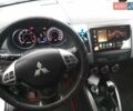 Белый Мицубиси Аутлендер ХЛ, объемом двигателя 2.36 л и пробегом 135 тыс. км за 11800 $, фото 7 на Automoto.ua