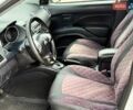 Білий Міцубісі Аутлендер ХЛ, об'ємом двигуна 2 л та пробігом 165 тис. км за 8999 $, фото 7 на Automoto.ua