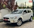 Белый Мицубиси Аутлендер ХЛ, объемом двигателя 2 л и пробегом 225 тыс. км за 11150 $, фото 1 на Automoto.ua
