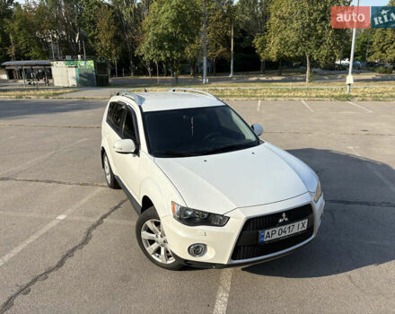 Белый Мицубиси Аутлендер ХЛ, объемом двигателя 2.36 л и пробегом 155 тыс. км за 10950 $, фото 78 на Automoto.ua