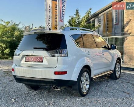 Мицубиси Аутлендер ХЛ 2011 в Виннице на Automoto.ua Белый Мицубиси Аутлендер ХЛ, объемом двигателя 2 л и пробегом 225 тыс. км за 10999 $, фото 13 на Automoto.ua