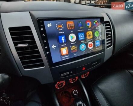 Білий Міцубісі Аутлендер ХЛ, об'ємом двигуна 2.36 л та пробігом 124 тис. км за 11300 $, фото 29 на Automoto.ua